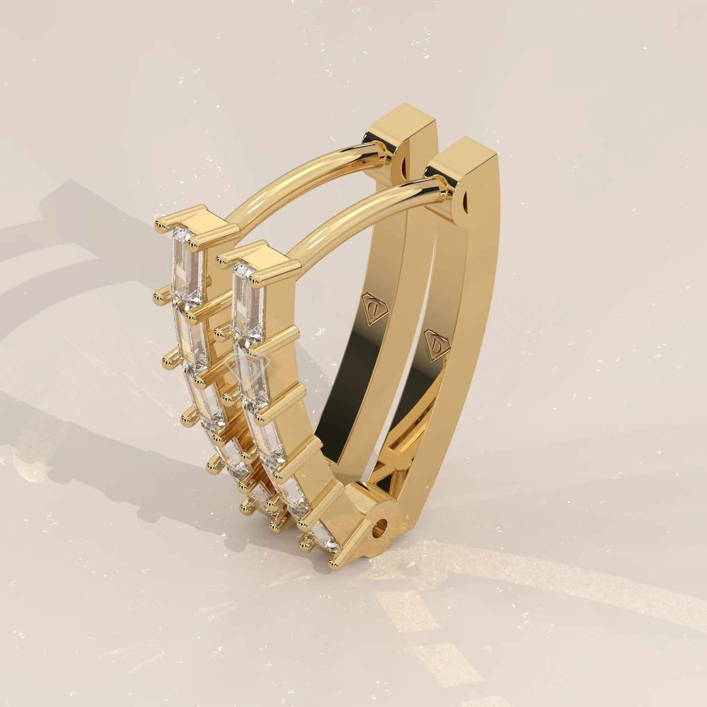 Three-Quarter View: Baguette Diamond Huggie Hoop Earrings with Prong Setting in Yellow Gold – Lab Grown – Driona Jewels