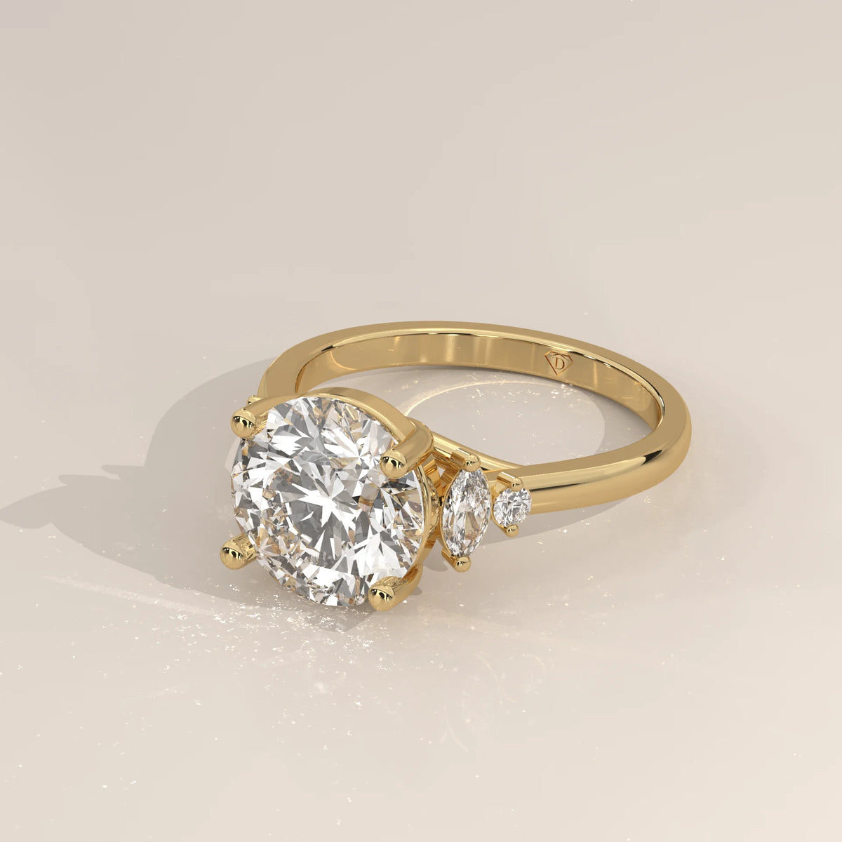 Round Lab Grown Diamond Ring with Marquise and Round Side Accents in yellow gold, shown at an angle.