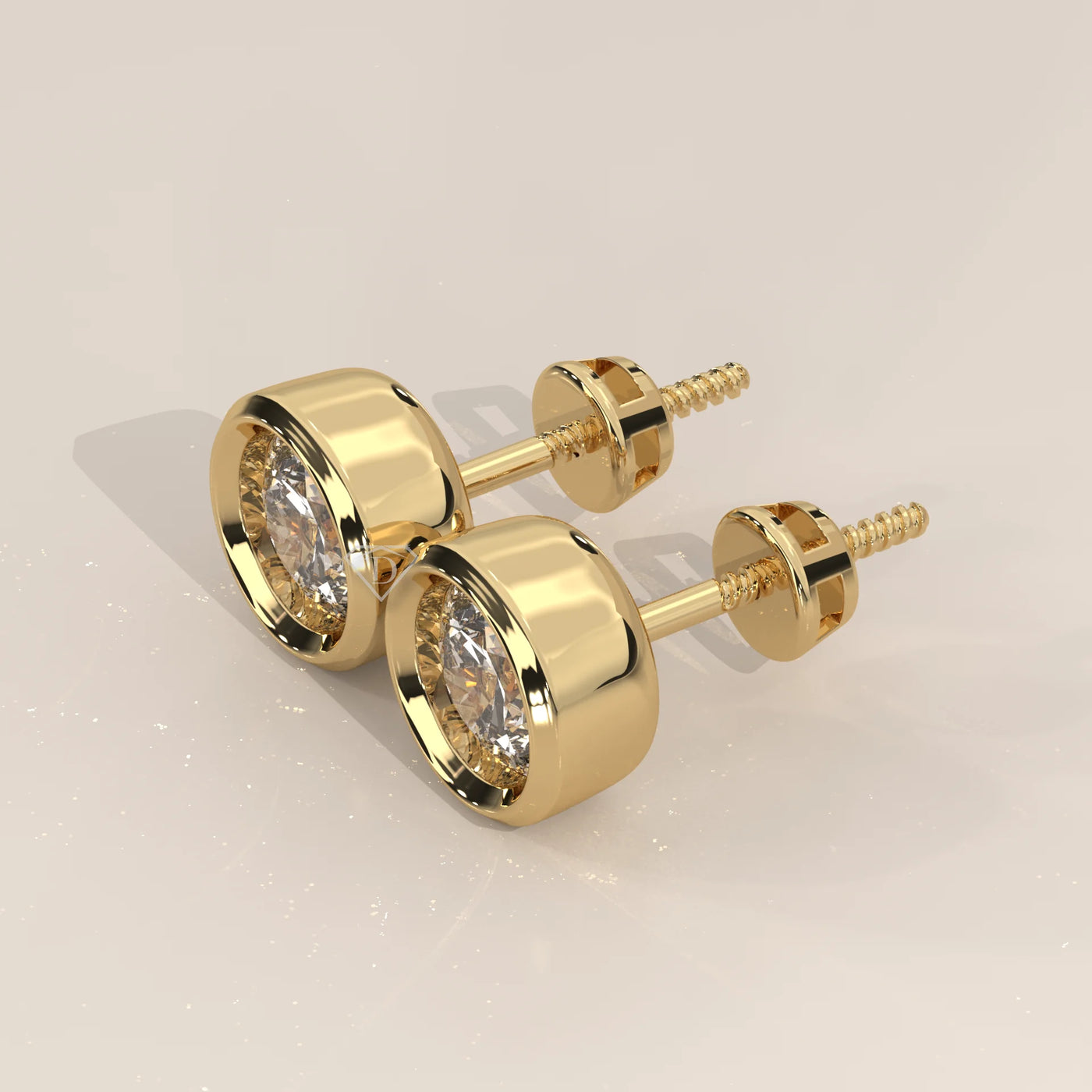 Three-Quarter View: Round Diamond Stud Earrings with Bezel Setting in Yellow Gold – Lab Grown – Driona Jewels