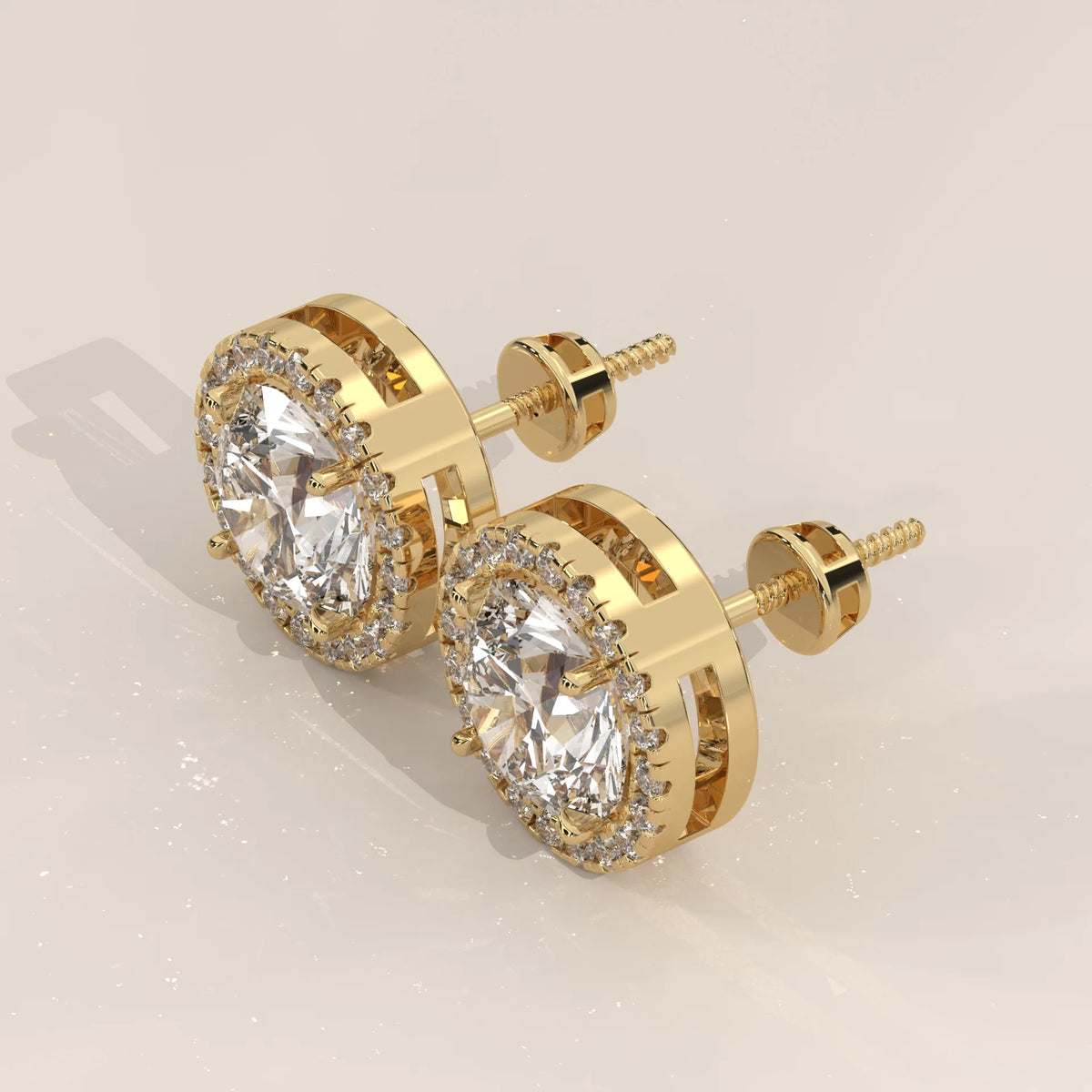 Round Halo Lab Grown Diamond Stud Earrings with Open Gallery in yellow gold, shown at an angle.