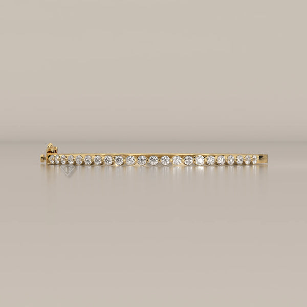 Round Lab Grown Diamond Hinged Bangle with Half Row of Stones in yellow gold, photographed head-on.