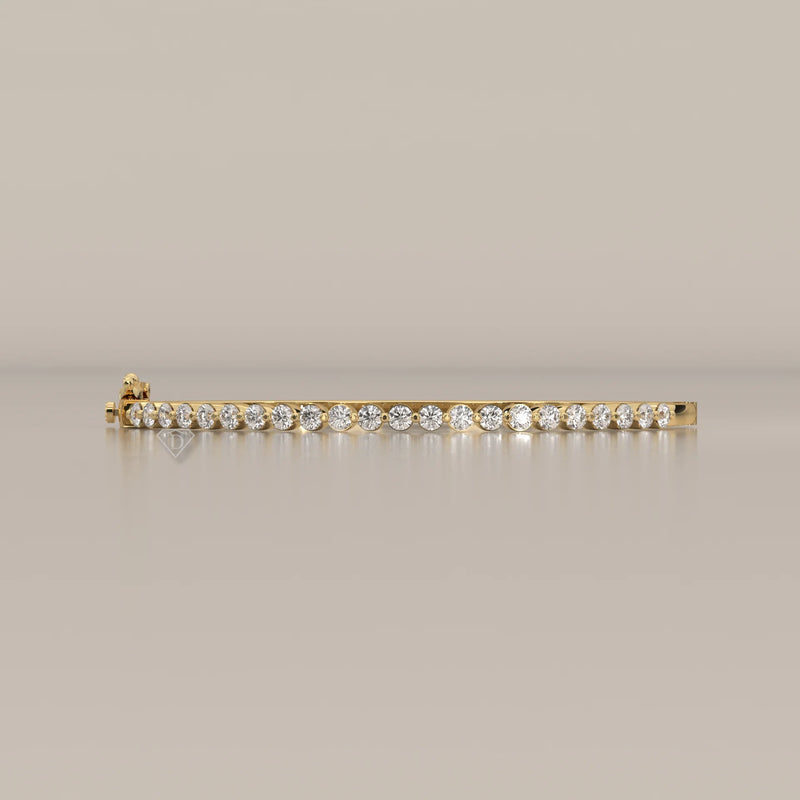 Round Lab Grown Diamond Hinged Bangle with Half Row of Stones in yellow gold, photographed head-on.