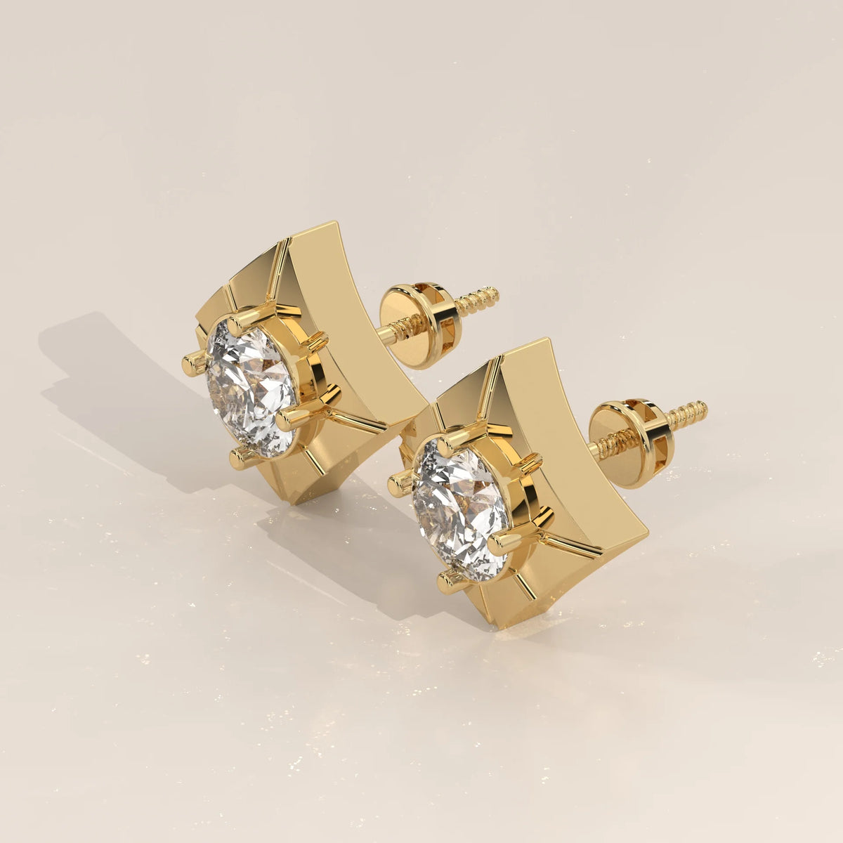 Round Lab Grown Diamond Studs on a Diamond Shaped Gold Plate in yellow gold, shown on a plain background.