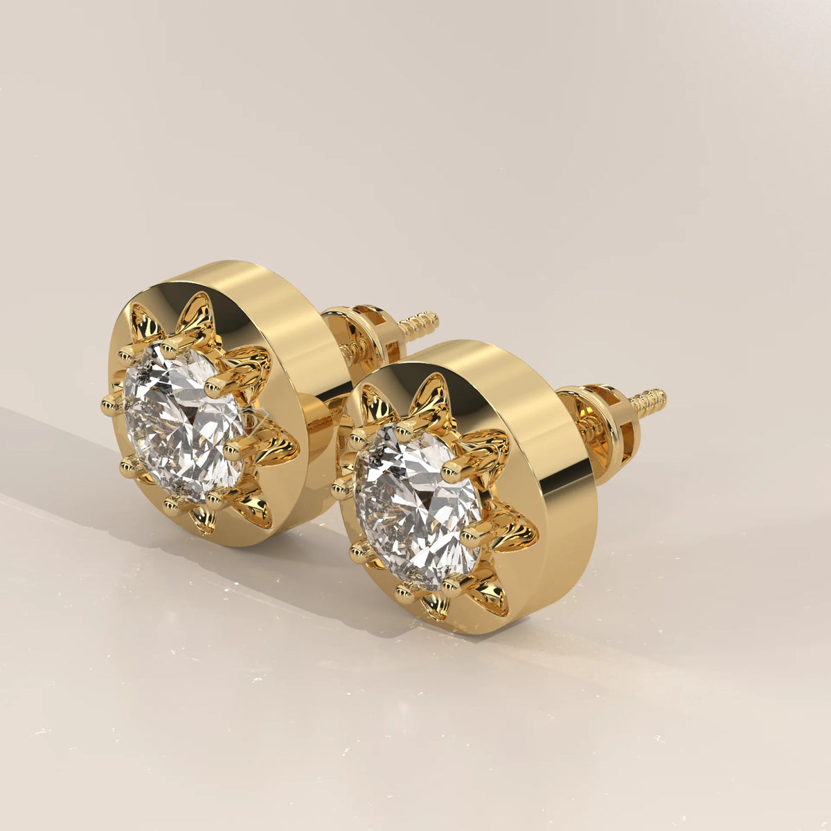 Round Lab Grown Diamond Studs in an Eight Claw Gold Disc Setting in yellow gold, shown at an angle.