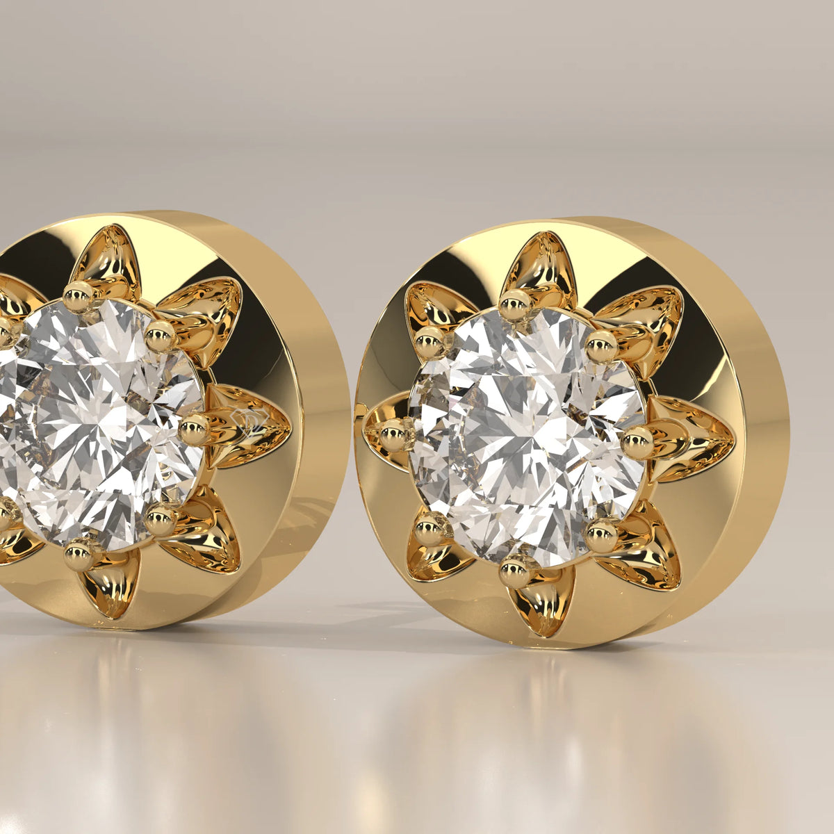 Round Lab Grown Diamond Studs in an Eight Claw Gold Disc Setting in yellow gold, photographed at a three-quarter angle.