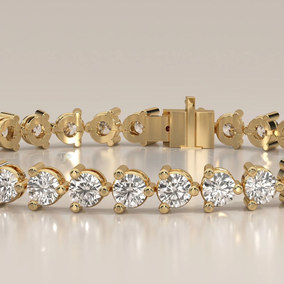 Round Lab Grown Diamond Tennis Bracelet in Three Prong Settings in yellow gold, detail view on a plain background.