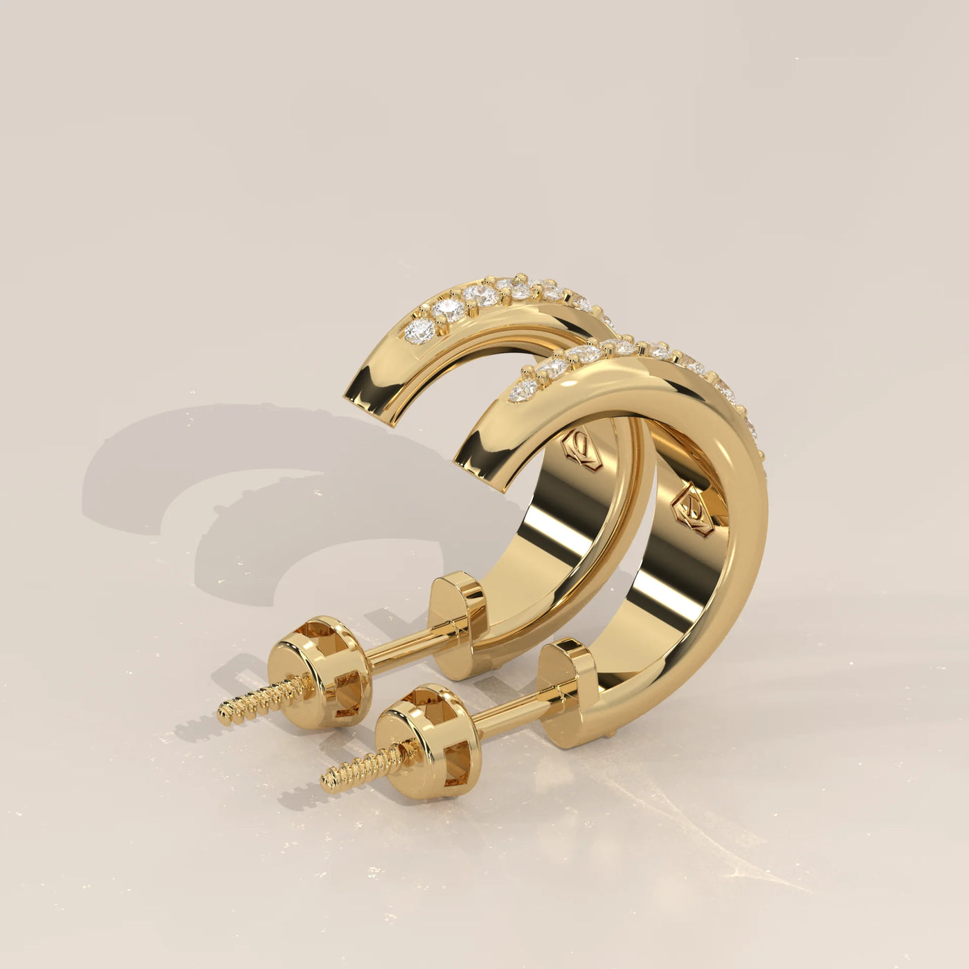Angle View: Round Diamond Huggie Hoop Earrings with Pavé Setting in Yellow Gold – Lab Grown – Driona Jewels