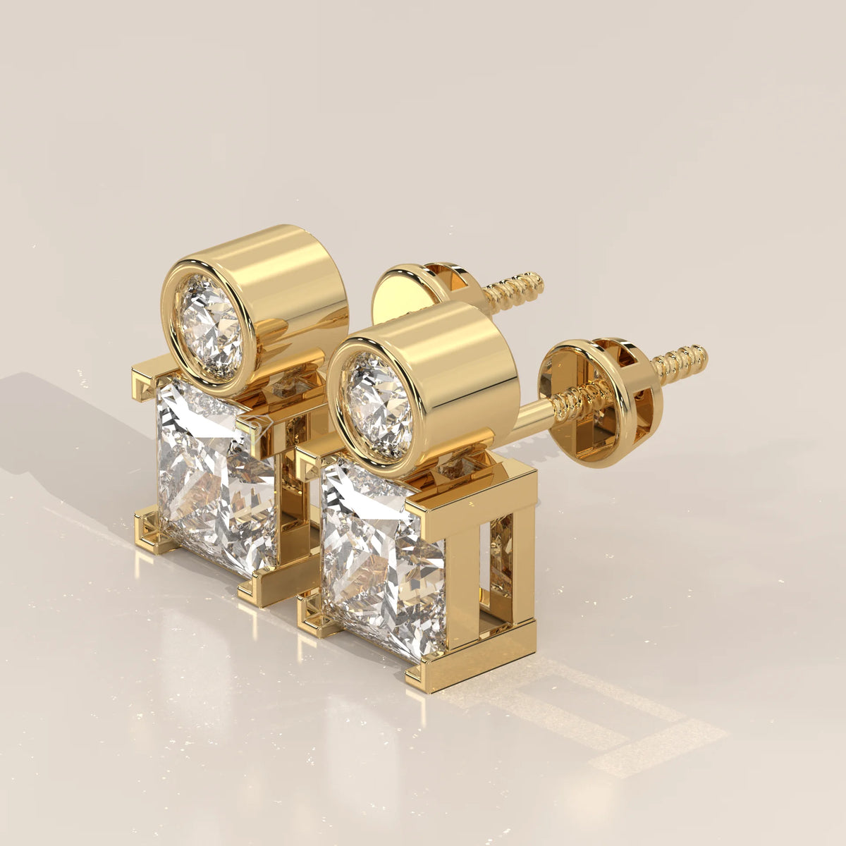 Round and Princess Two Stone Lab Grown Diamond Stud Earrings in yellow gold, shown on a plain background.