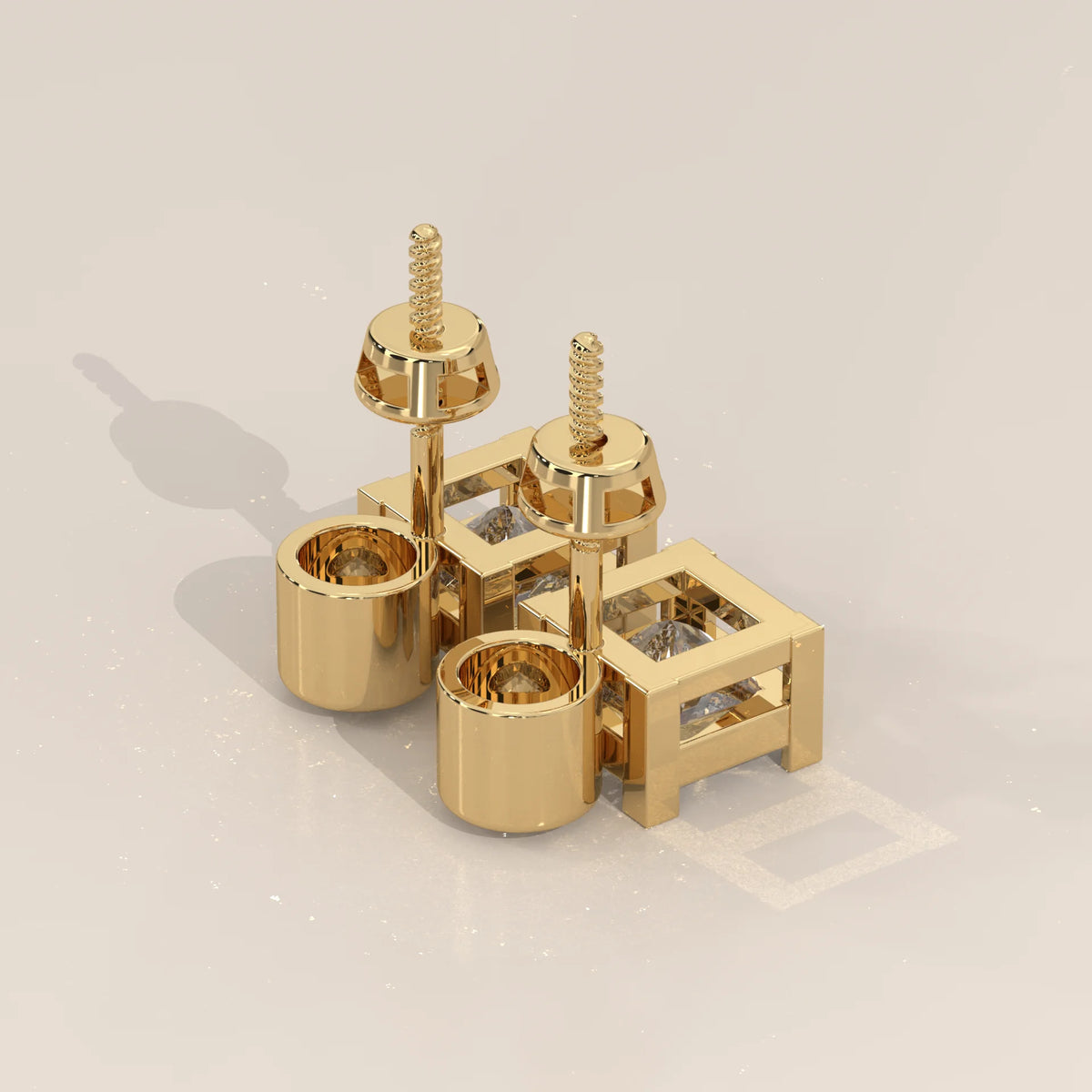 Round and Princess Two Stone Lab Grown Diamond Stud Earrings in yellow gold, product photograph on a plain background.