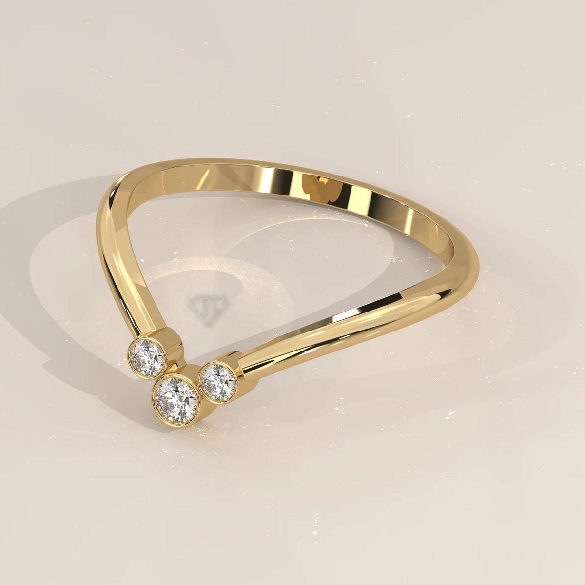 Sharp V Chevron Ring with a Three Diamond Bezel Cluster in yellow gold, shown at an angle.