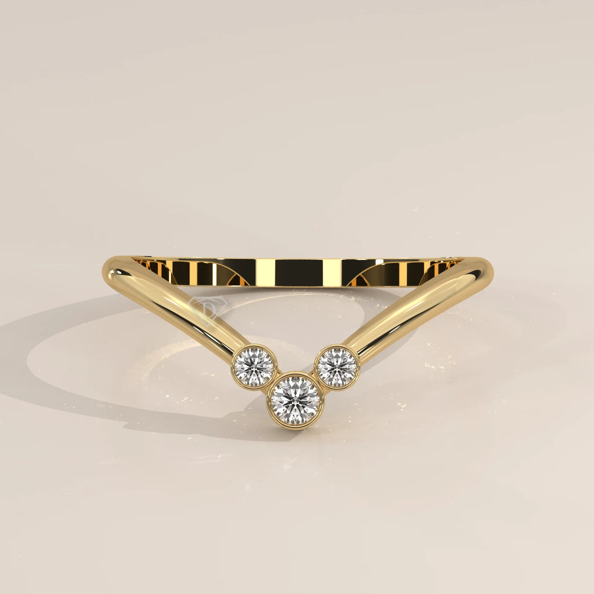 Sharp V Chevron Ring with a Three Diamond Bezel Cluster in yellow gold, photographed head-on.