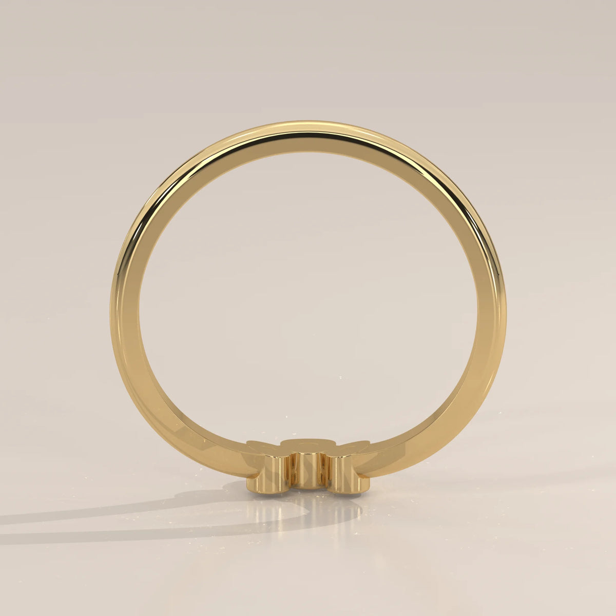 Sharp V Chevron Ring with a Three Diamond Bezel Cluster in yellow gold, front view on a plain background.