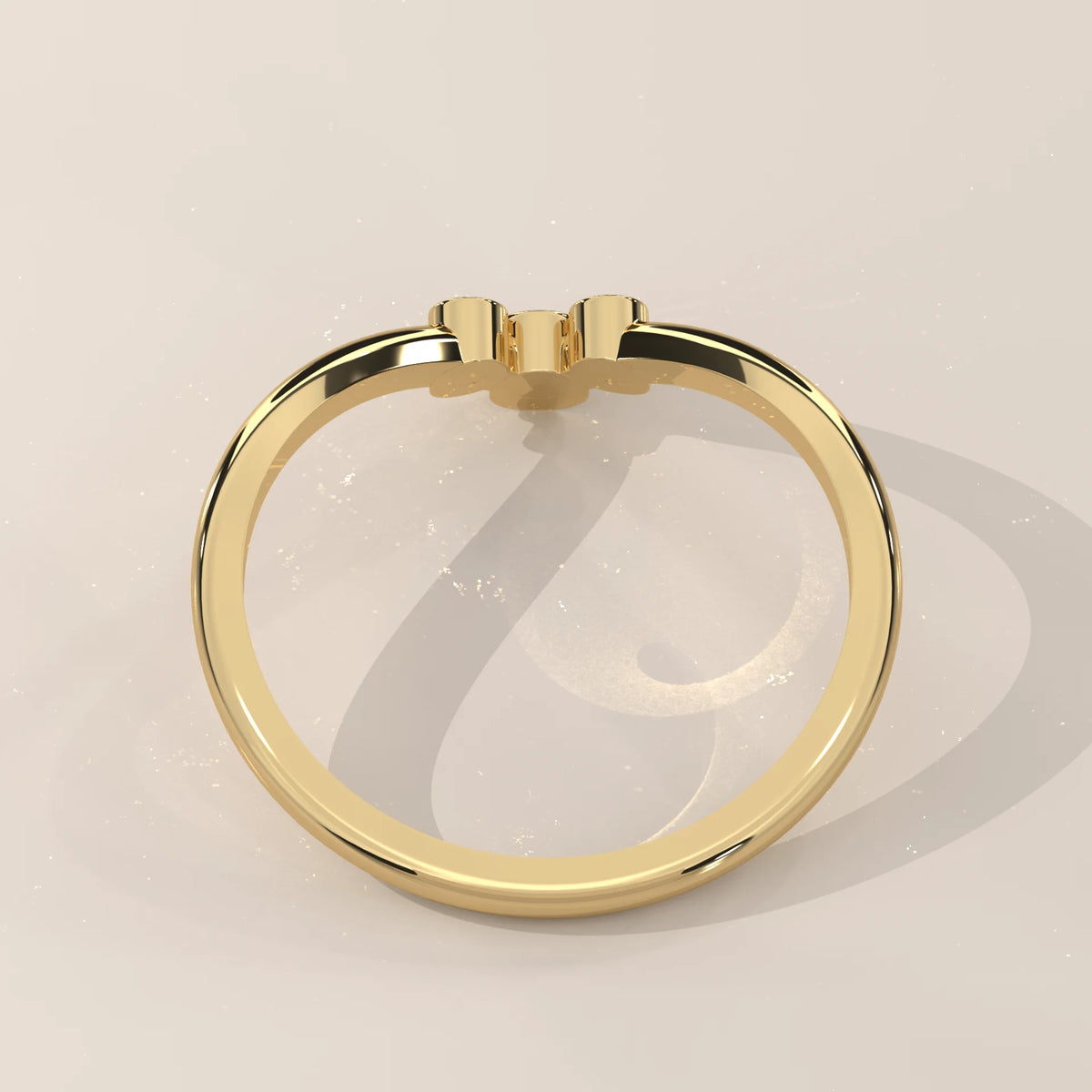 Sharp V Chevron Ring with a Three Diamond Bezel Cluster in yellow gold, shown from the side.