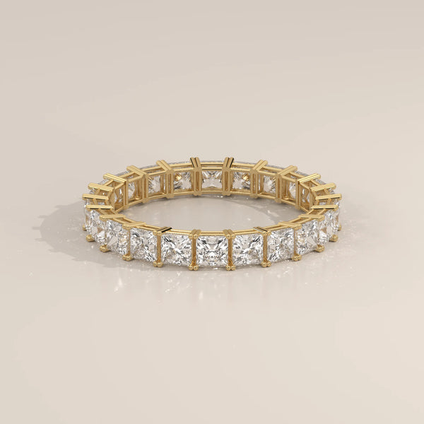 Slim Princess Cut Diamond Full Eternity Wedding Band in Gold in yellow gold, shown on a plain background.