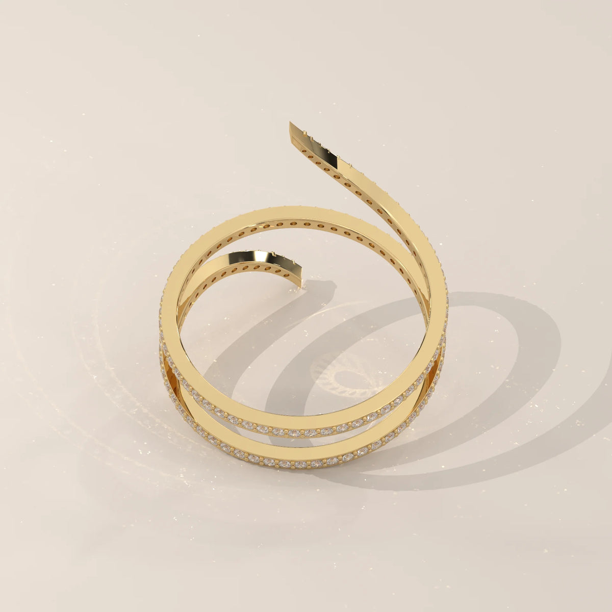 Round Lab Grown Diamond Pave Coil Ring with Tapered Pointed Ends in yellow gold, photographed at a three-quarter angle.