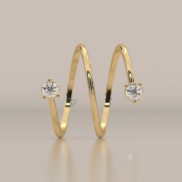 Round Lab Grown Diamond Spiral Wrap Ring with Two Claw Set Ends in yellow gold, product photograph on a plain background.