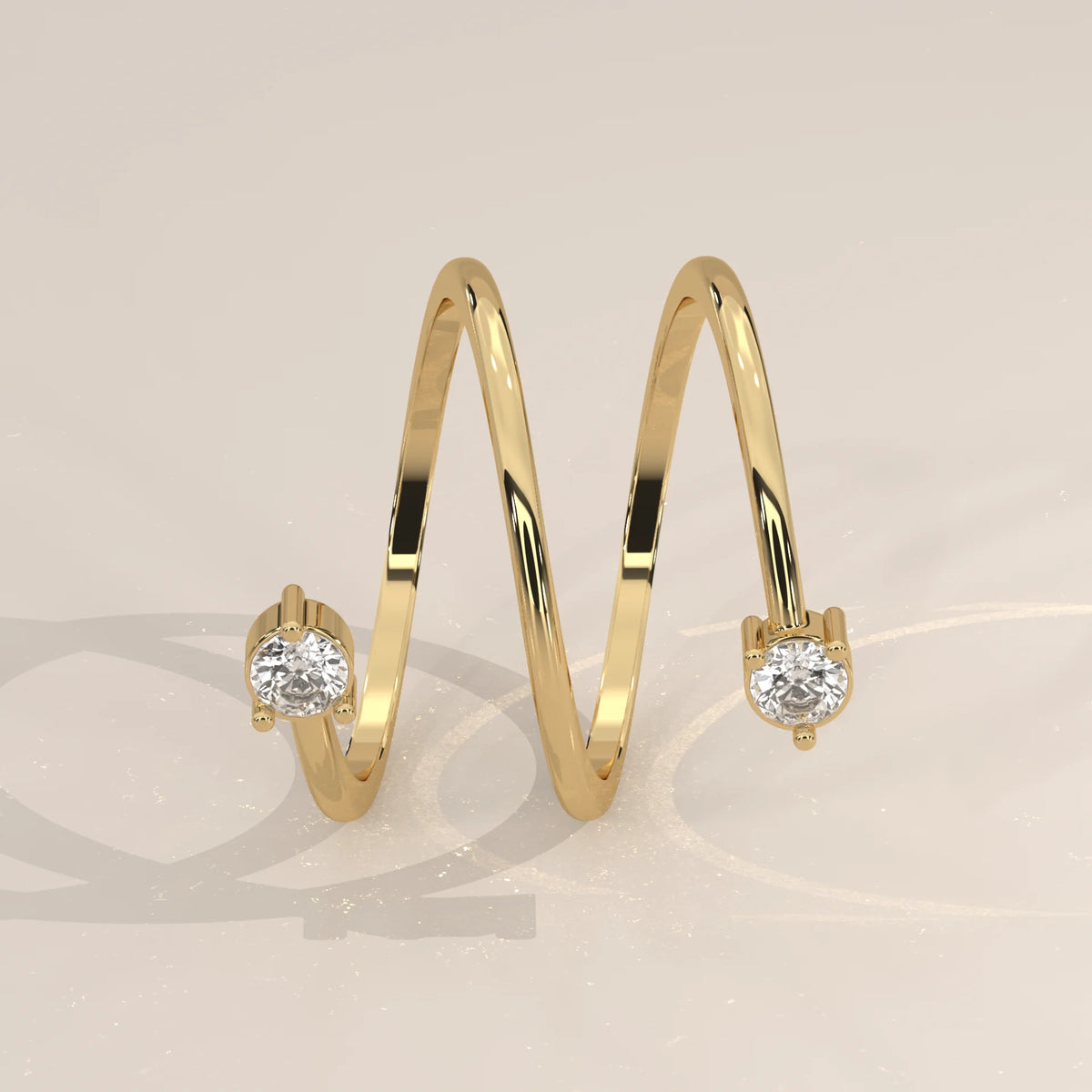 Round Lab Grown Diamond Spiral Wrap Ring with Two Claw Set Ends in yellow gold, shown from the front.