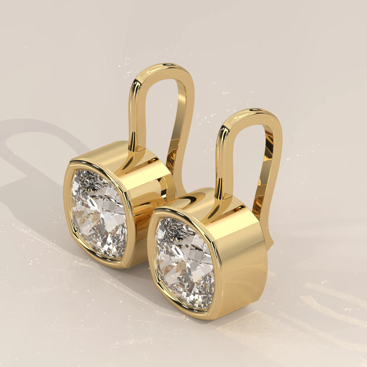 Square Cushion Bezel Lab Grown Diamond Drop Earrings on Gold Hook in yellow gold, shown at an angle.