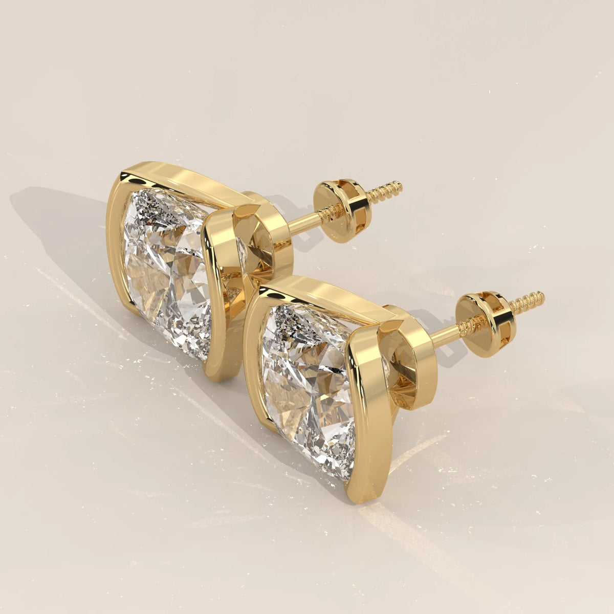 Square Cushion Half Bezel Lab Grown Diamond Stud Earrings in yellow gold, shown from the side.