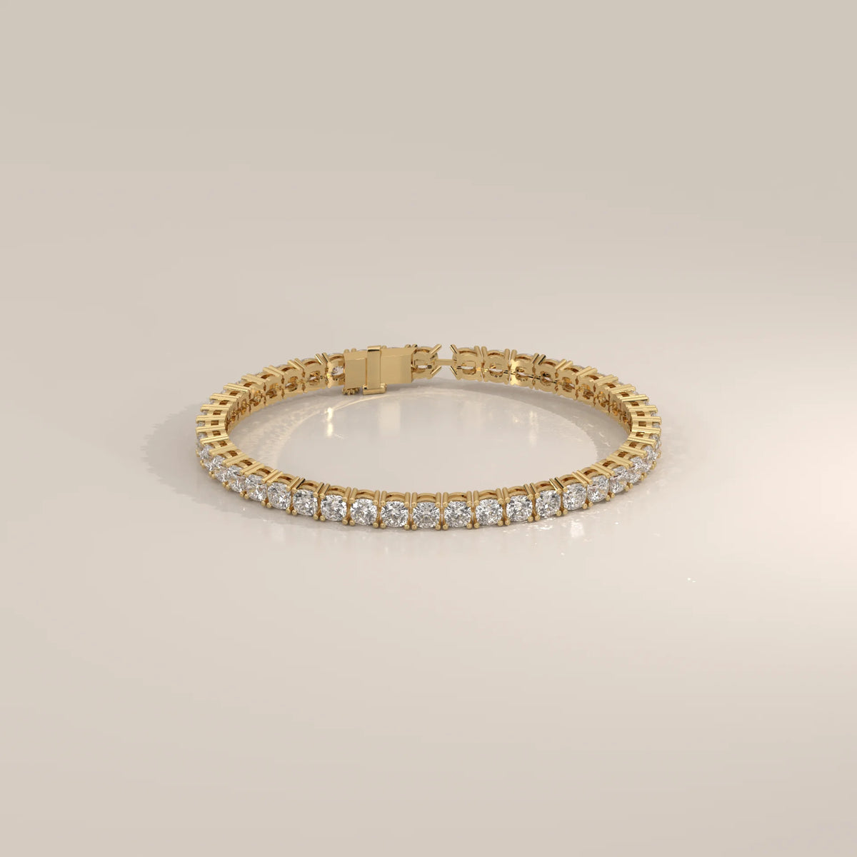 Square Cushion Lab Grown Diamond Tennis Bracelet, Four Prong in yellow gold, shown from the front.