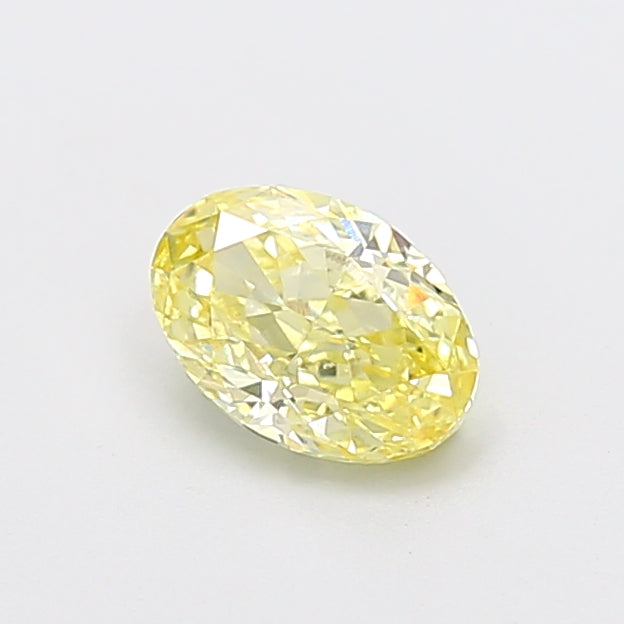 1.05 carat fancy yellow oval lab grown diamond VS1 clarity