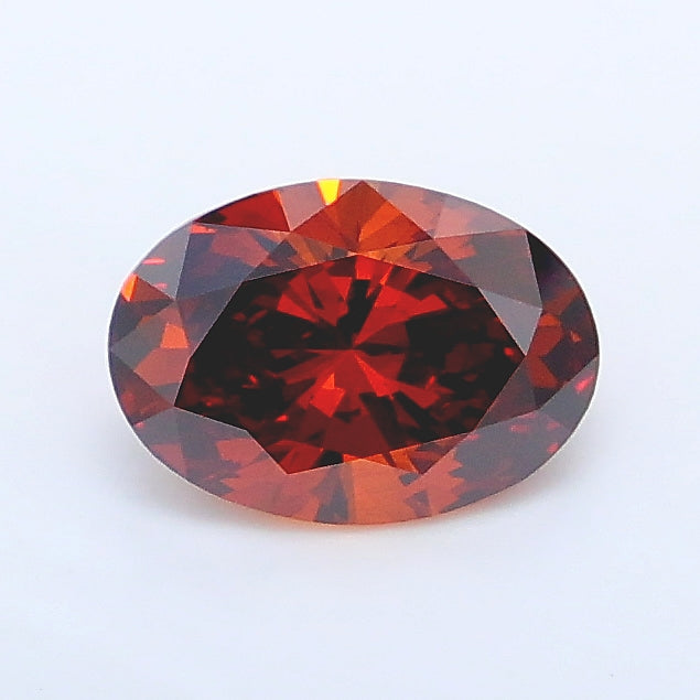1.07 carat fancy intense brownish orange oval lab grown diamond SI1 clarity