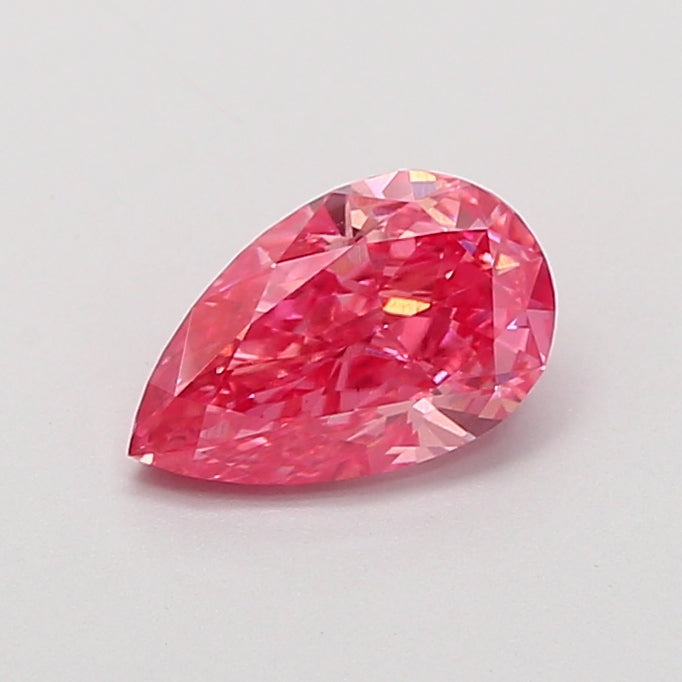 0.91 carat fancy vivid pink pear lab grown diamond VS2 clarity