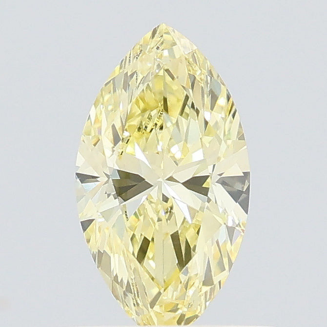 0.59 carat fancy intense yellow marquise lab grown diamond VVS2 clarity