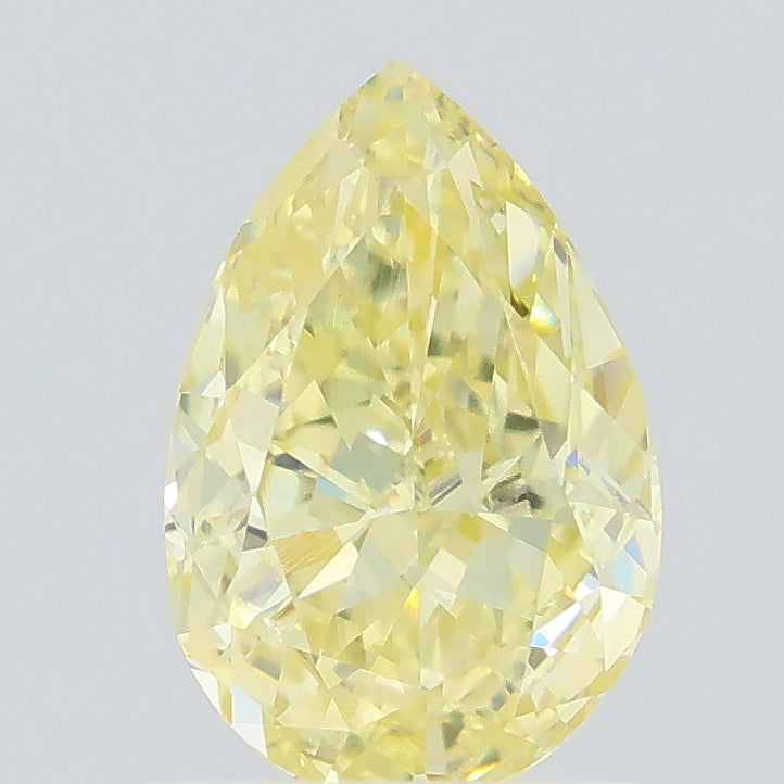 0.83 carat fancy yellow pear lab grown diamond VVS2 clarity