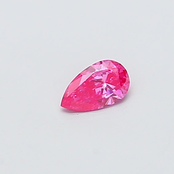 0.40 carat fancy vivid pink pear lab grown diamond VS1 clarity
