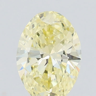 0.39 carat light yellow oval lab grown diamond VS1 clarity