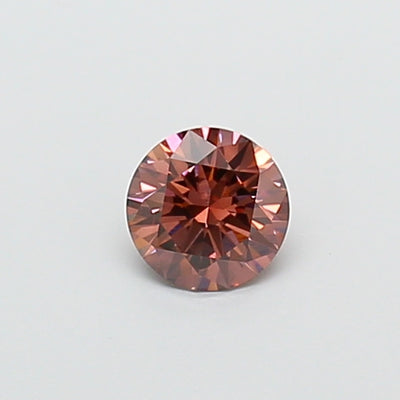 0.63 carat fancy pinkish brown round lab grown diamond VVS2 clarity