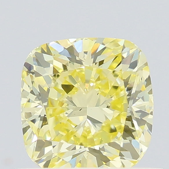 0.72 carat fancy yellow cushion lab grown diamond VS2 clarity