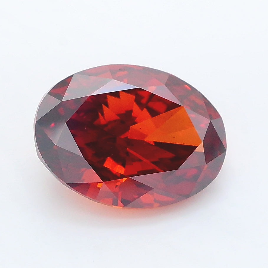 3.08 carat fancy deep brownish orange oval lab grown diamond VS2 clarity