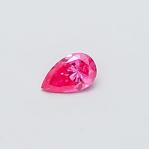 0.34 carat fancy vivid pink pear lab grown diamond VS1 clarity