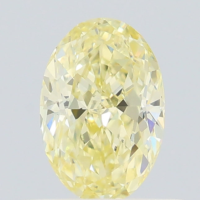 0.63 carat fancy light yellow oval lab grown diamond VVS2 clarity