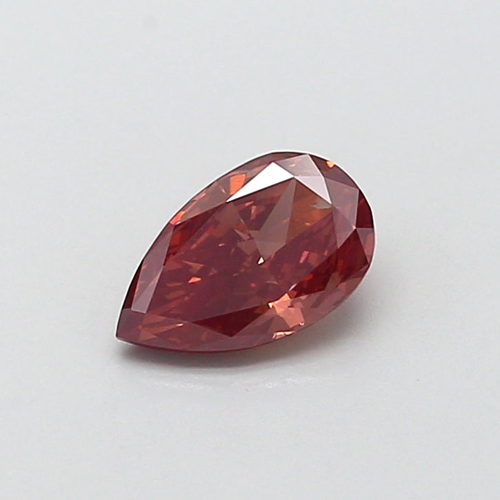 0.73 carat fancy pink brown pear lab grown diamond VS1 clarity