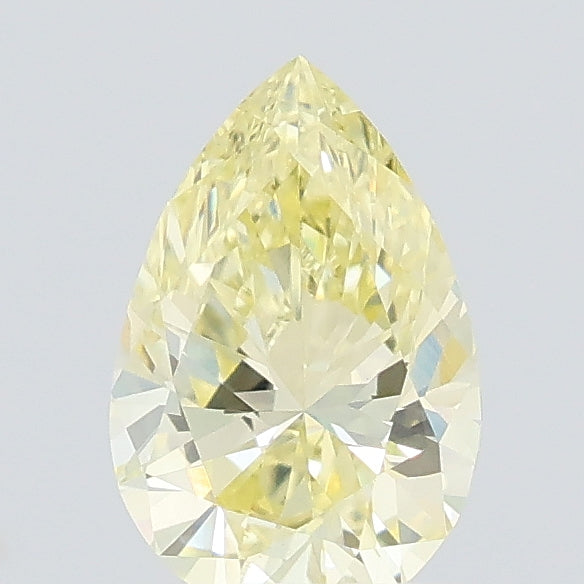 0.47 carat fancy yellow pear lab grown diamond VS1 clarity