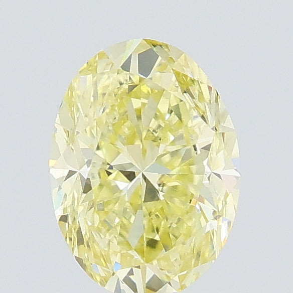 0.71 carat fancy yellow oval lab grown diamond VVS2 clarity