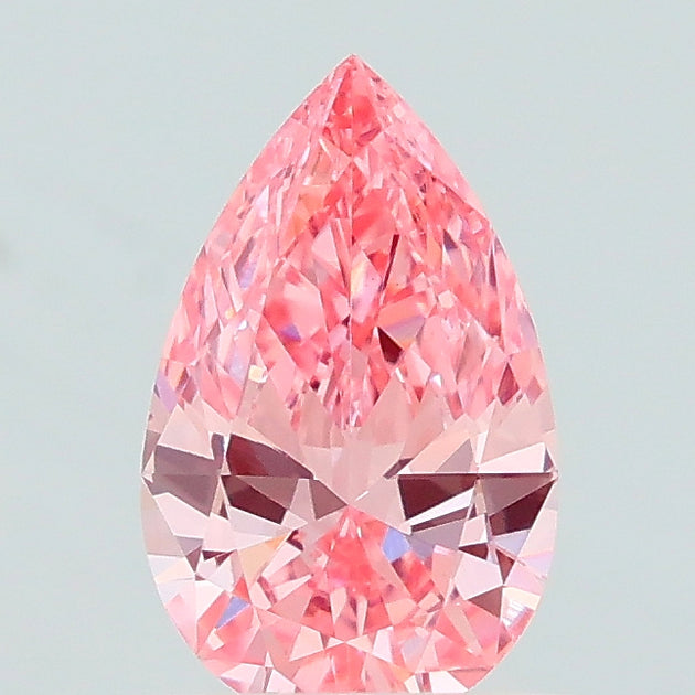 0.61 carat fancy vivid pink pear lab grown diamond VS2 clarity