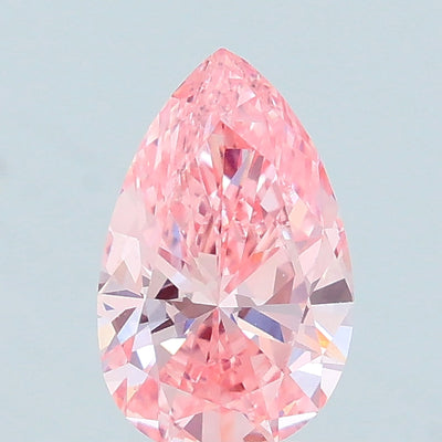 0.65 carat fancy intense pink pear lab grown diamond VS2 clarity