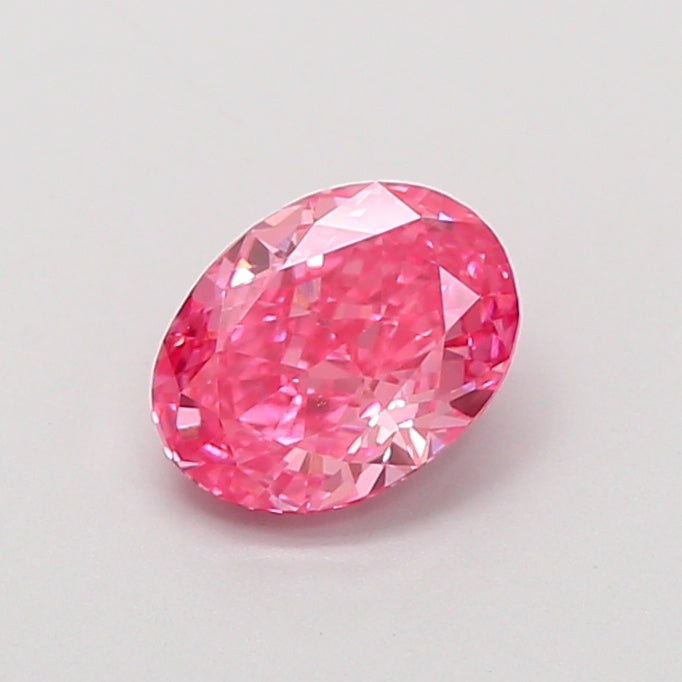 0.91 carat fancy vivid pink oval lab grown diamond VVS2 clarity