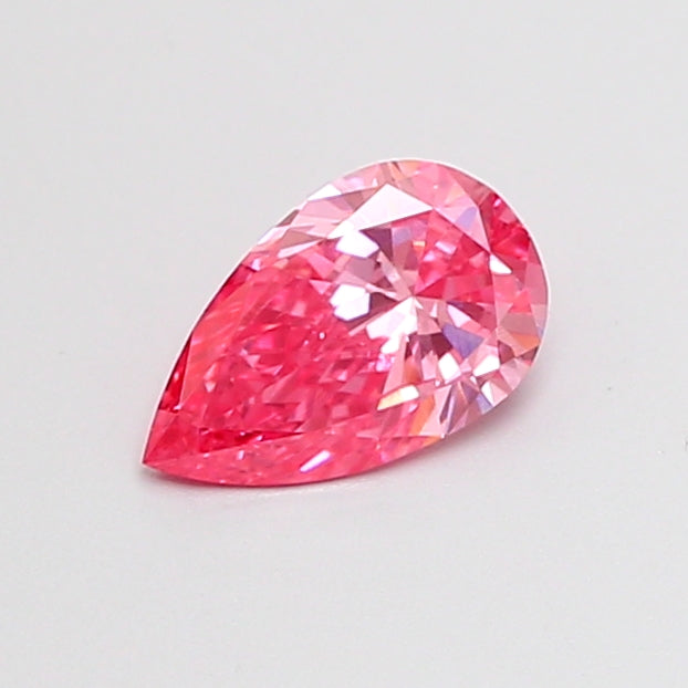 0.44 carat fancy vivid pink pear lab grown diamond VS1 clarity