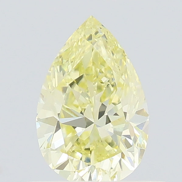 0.54 carat fancy yellow pear lab grown diamond VVS2 clarity