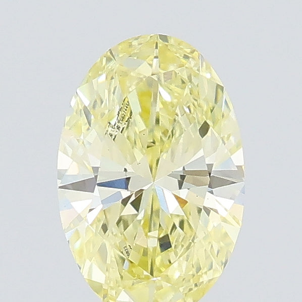 0.58 carat fancy intense yellow oval lab grown diamond VS1 clarity