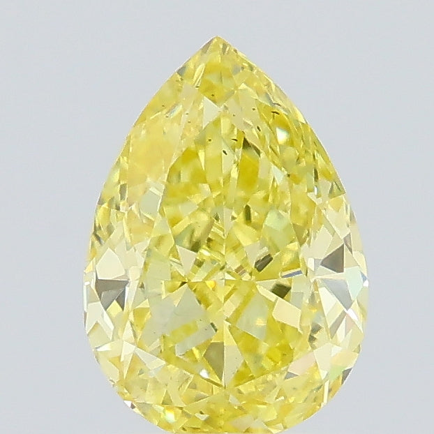 0.54 carat fancy intense yellow pear lab grown diamond VS2 clarity