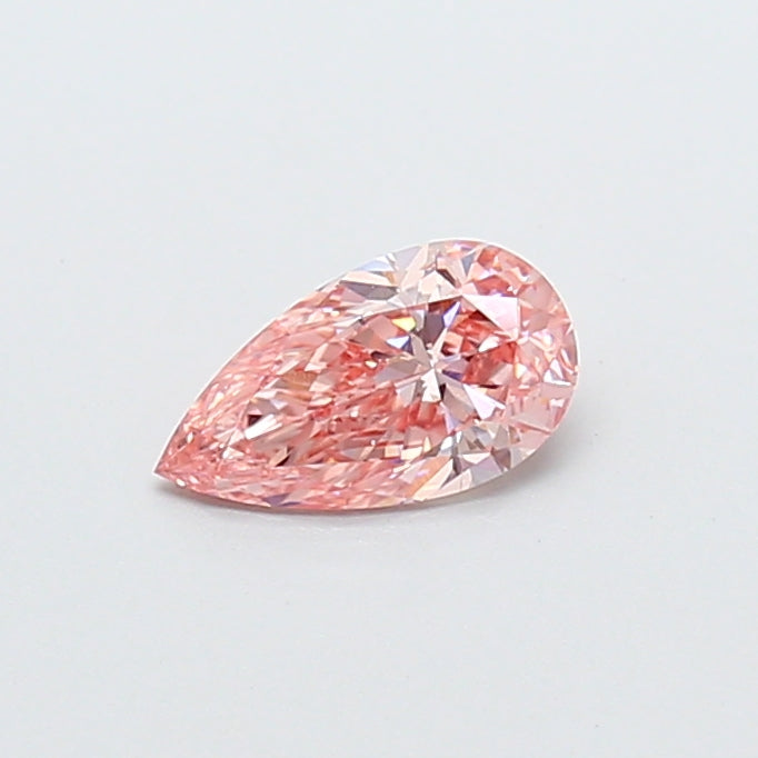 0.57 carat fancy vivid pink pear lab grown diamond VS1 clarity