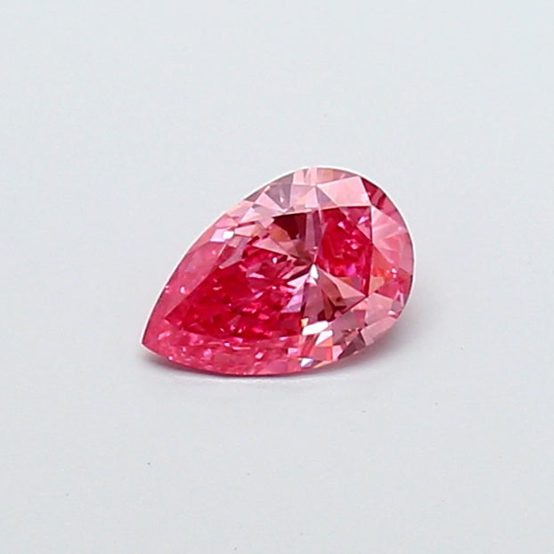 0.59 carat fancy vivid pink pear lab grown diamond VS1 clarity