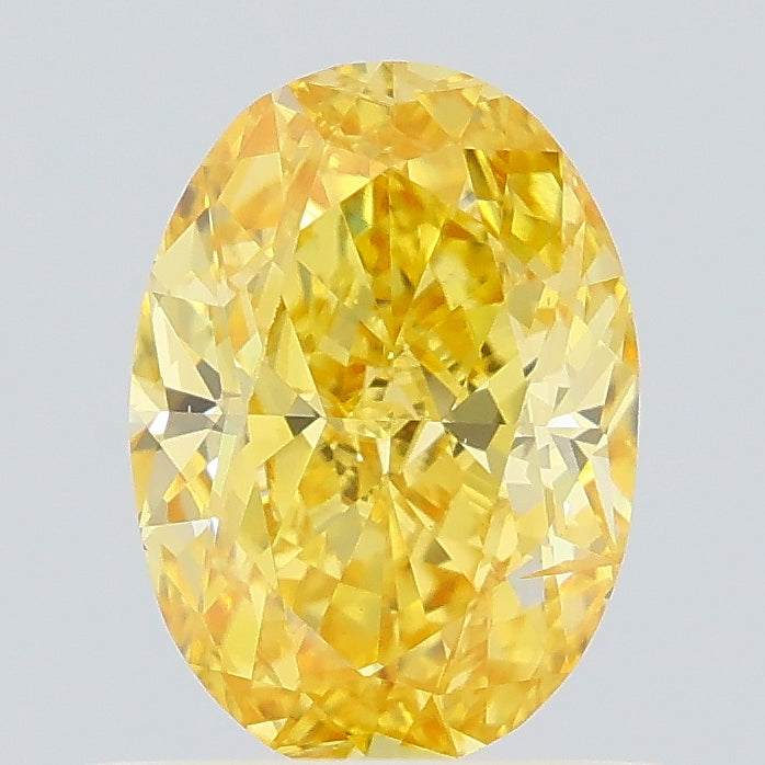0.87 carat fancy intense yellow oval lab grown diamond SI2 clarity