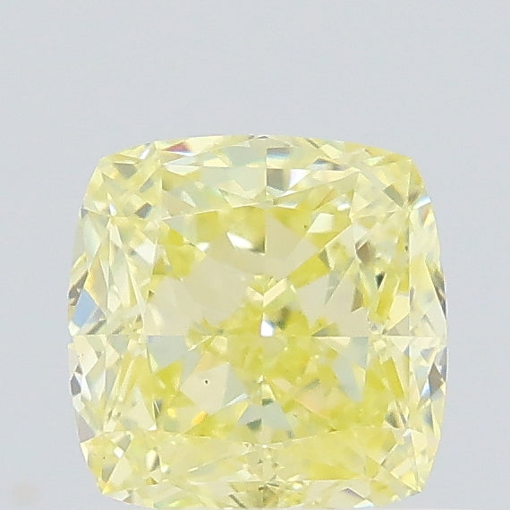 0.61 carat fancy yellow cushion lab grown diamond VS1 clarity